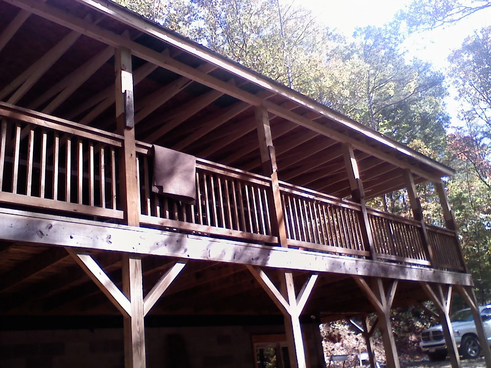 Timber framing under a new elevated porch and deck — Roof Leak Repair in Tulsa by Roofing Brothers